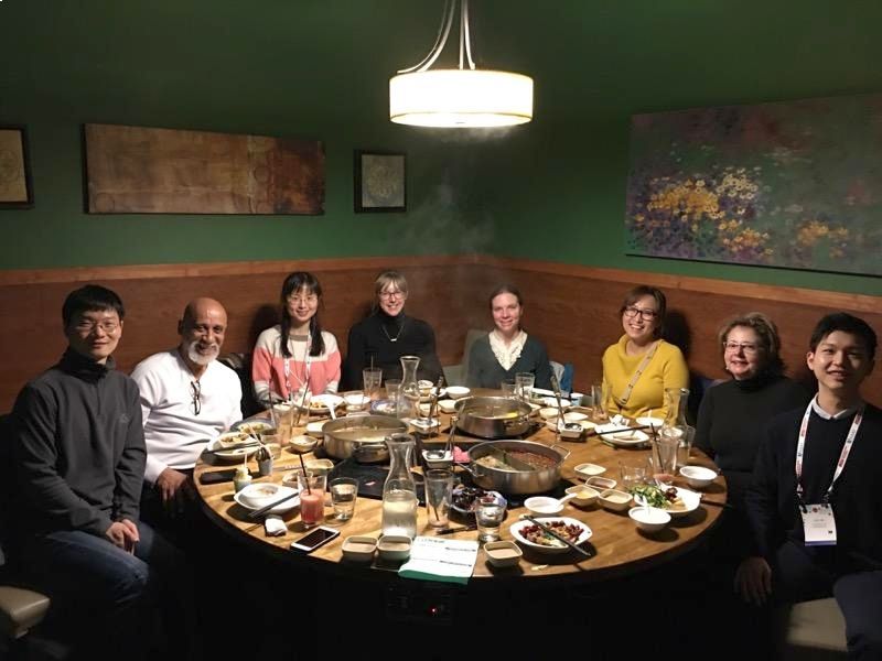 Joe Lim with conference group eating
