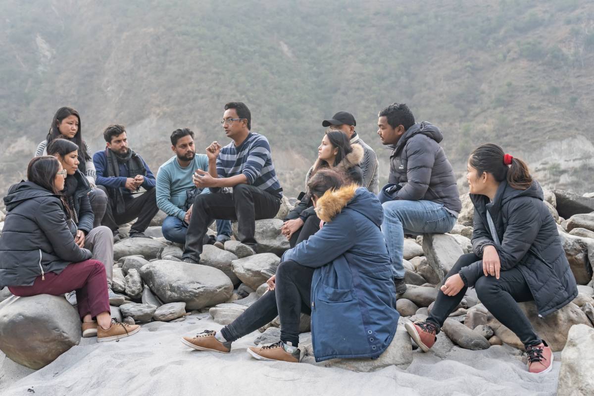 Biraj teaching students in the mountains